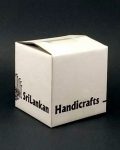 white shipping box featuring "Handcrafts" in a single color print, made from sturdy 3-ply corrugated cardboard.