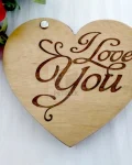 made to display jewelry and open sideways. Ideal for hold couple rings at display ceremonial wedding moment. specially design to hold two rings side by side. Lid laser engraved with "I love you" and inside brown velvet inlay for elegant look.