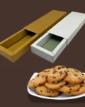 Sliding paperboard box for chocolates, cookies, and small gifts, with a sleek and elegant design.