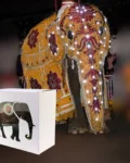 Elegant gift box with multicolor elephant design and informative text