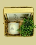 White Gardenia Gift Box – candle, rotating photo frame, and artificial plant in a handcrafted rush basket