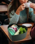 Heart-shaped gift box with candle, stainless steel water bottle, and potted plant – a thoughtful gift for a friend