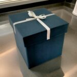 Shiny Blue Gift Box with Silver Ribbon Bow