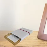 White Photo Frame Box With Red Ribbon