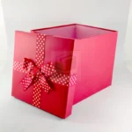 Shiny Red Gift Box with White Polka Dot Ribbon - Image 2