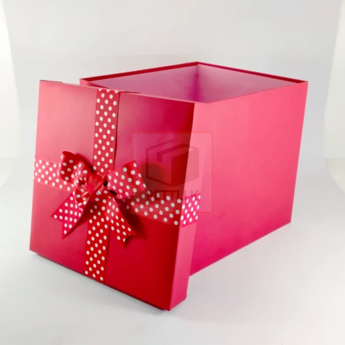 Shiny Red Gift Box with White Polka Dot Ribbon - Image 2