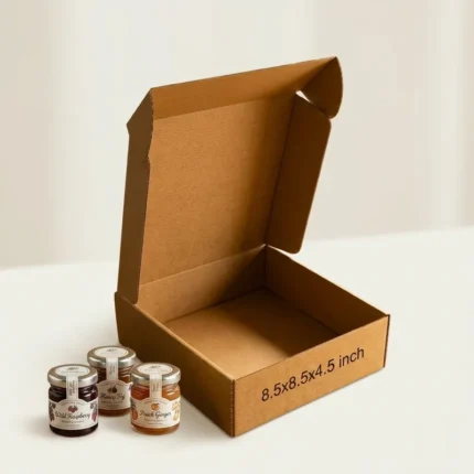 Open kraft brown 3 ply corrugated box with dimensions 8.5 by 8.5 by 4.5 inches printed on the side, ideal for secure product shipping and mailer packaging.