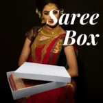 White Saree Box made of 350gsm board containing a folded red and gold bridal saree
