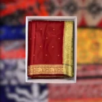 White Saree Box made of 350gsm board containing a folded red and gold bridal saree