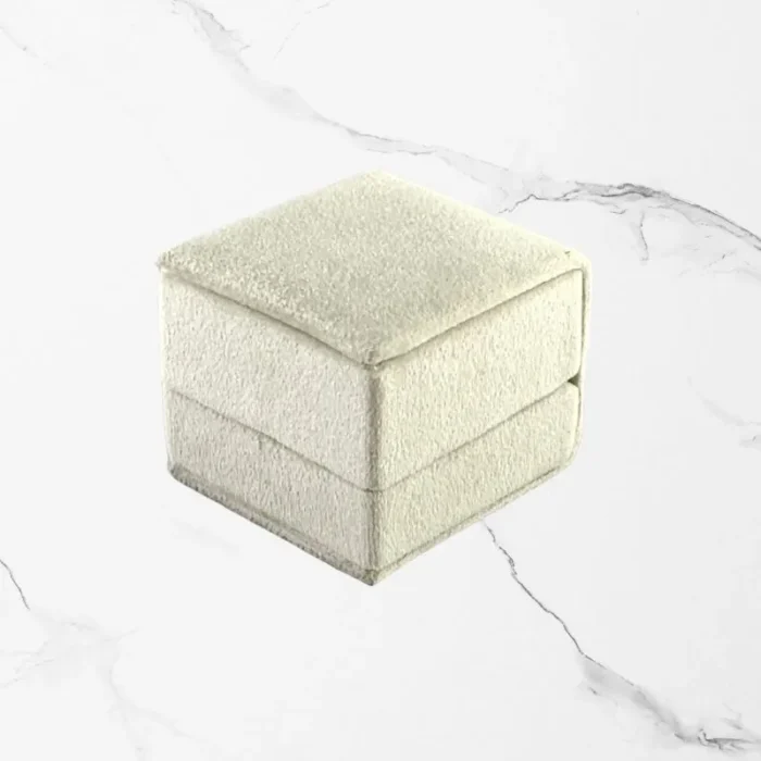 Premium White Velvet Ring Box featuring a luxury engagement ring on a wedding-themed background.