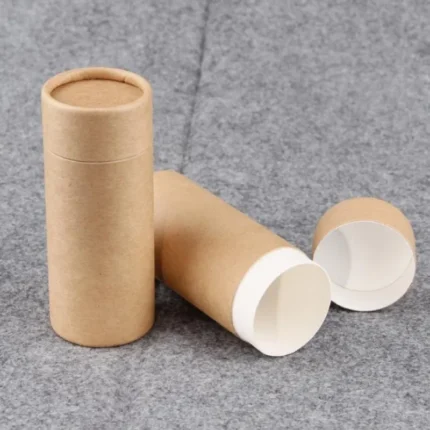 A tall, slim 450ml natural brown craft Paper Canister measuring 2.5x6 inches with its 1-inch lid
