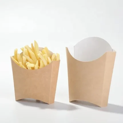 brown kraft paper french fry holder scoop cups with white inner lining, one empty and one filled with hot french fries.