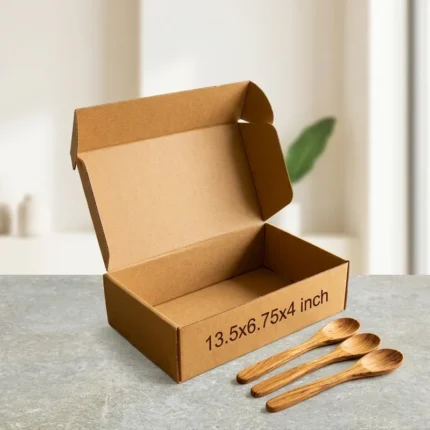 An open kraft brown 3 ply corrugated box displaying dimensions 13.5x6.75x4 inch
