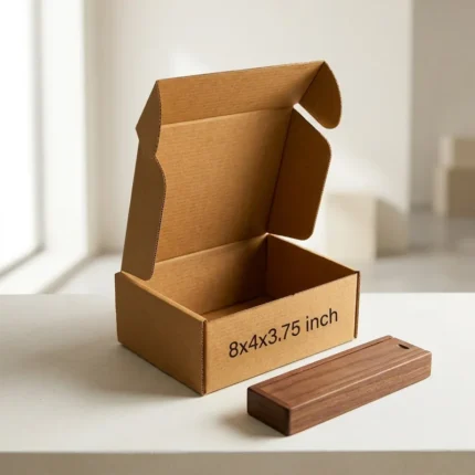 An open kraft brown 3 ply corrugated box displaying dimensions 8x4x3.75 inch