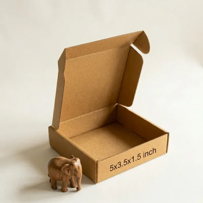 An open kraft brown 3 ply corrugated box displaying dimensions 5x3.5x1.5 inch