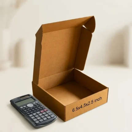 Open kraft brown corrugated box (3 ply) showing dimensions 6.5 x 4.5 x 2.5 inches
