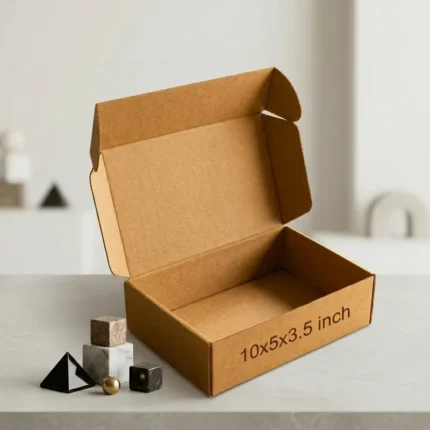 An open kraft brown 3 ply corrugated box displaying dimensions 10x5x3.5 inch
