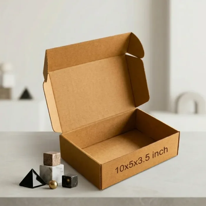 An open kraft brown 3 ply corrugated box displaying dimensions 10x5x3.5 inch