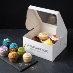 Premium white 4-cupcake box with clear top window and custom insert tray showing a 6x6x4 inch size
